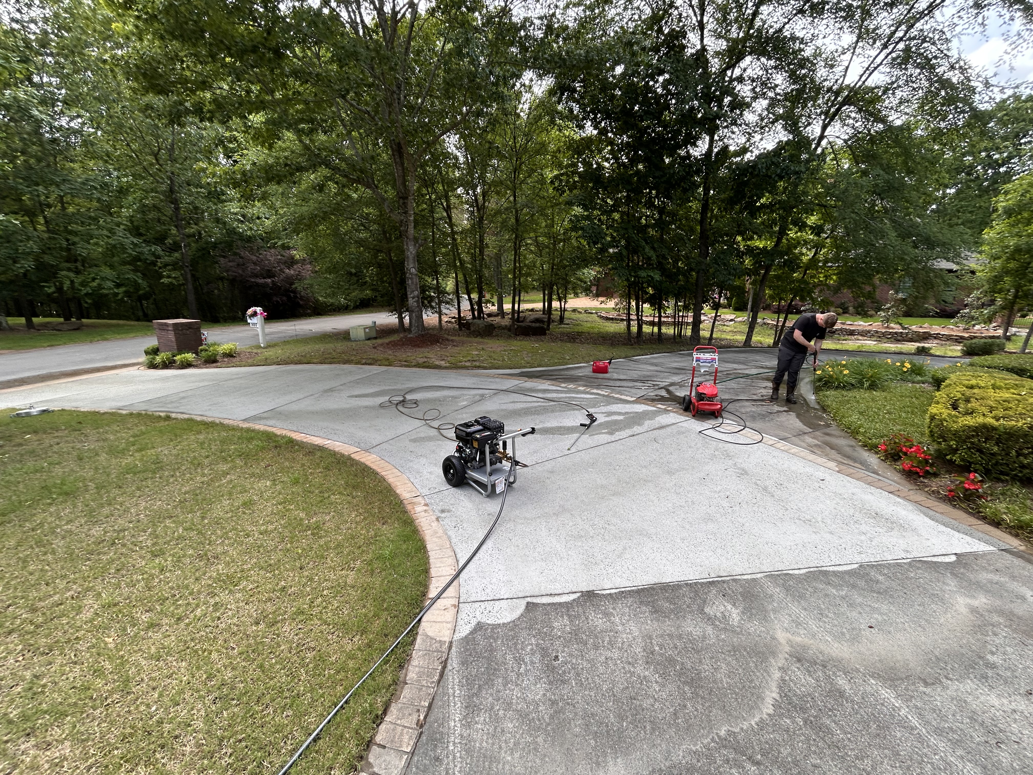 Smith Pressure Washing cleaning a driveway